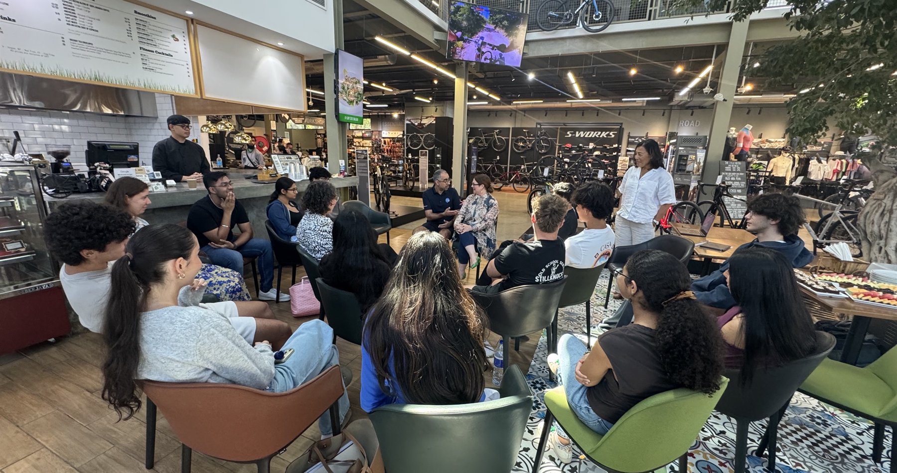 Young people participating in a facilitated group discussion at a YouthConnectHub gathering.