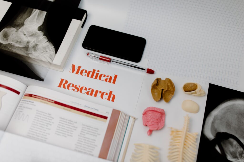 Medical and study materials representing healthcare, learning and youth development.