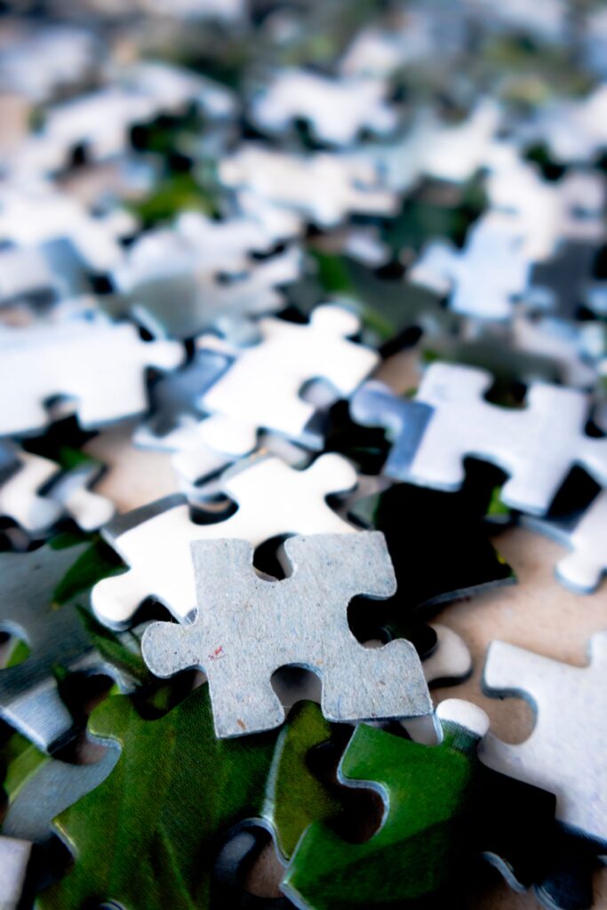 Close-up of a jigsaw puzzle representing creativity, problem-solving and design thinking.