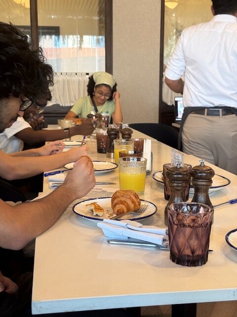 Students write notes and reflect during a practical forum activity.