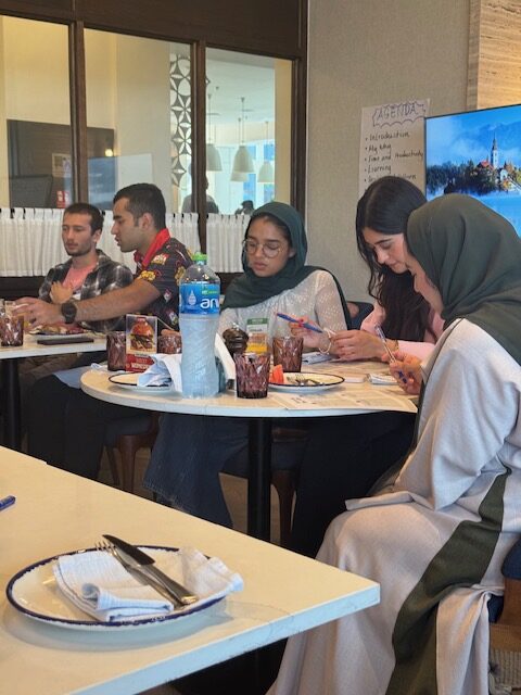 Students write and reflect during a structured workshop activity.